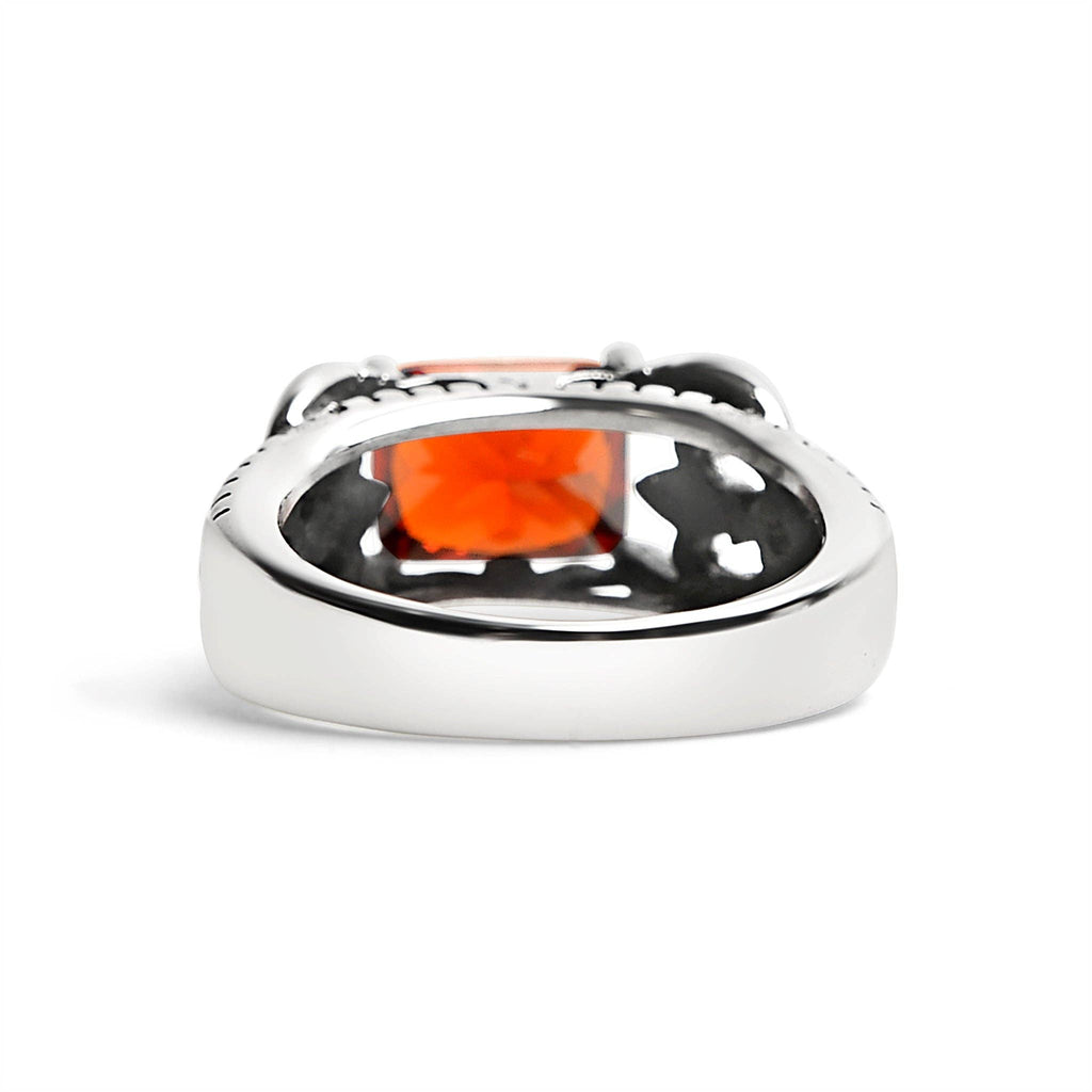 Anillo de acero inoxidable con detalles en forma de flor de lis en forma de circonita cúbica roja: 12