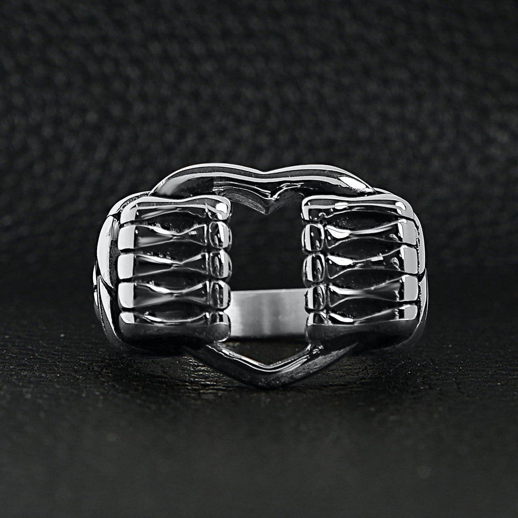 Anillo de acero inoxidable pulido con forma de corazón agarrado por hueso: 8