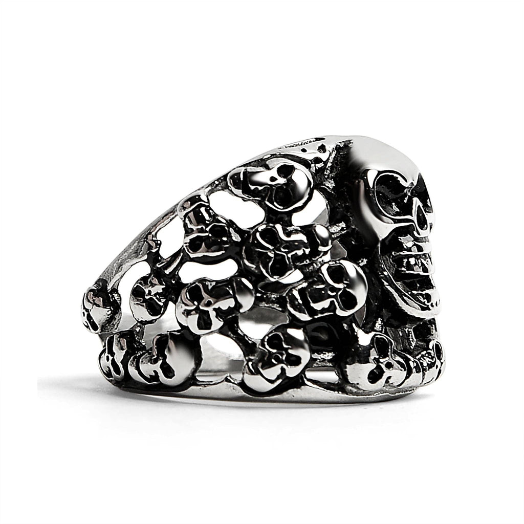 Anillo de acero inoxidable pulido con múltiples calaveras: 9
