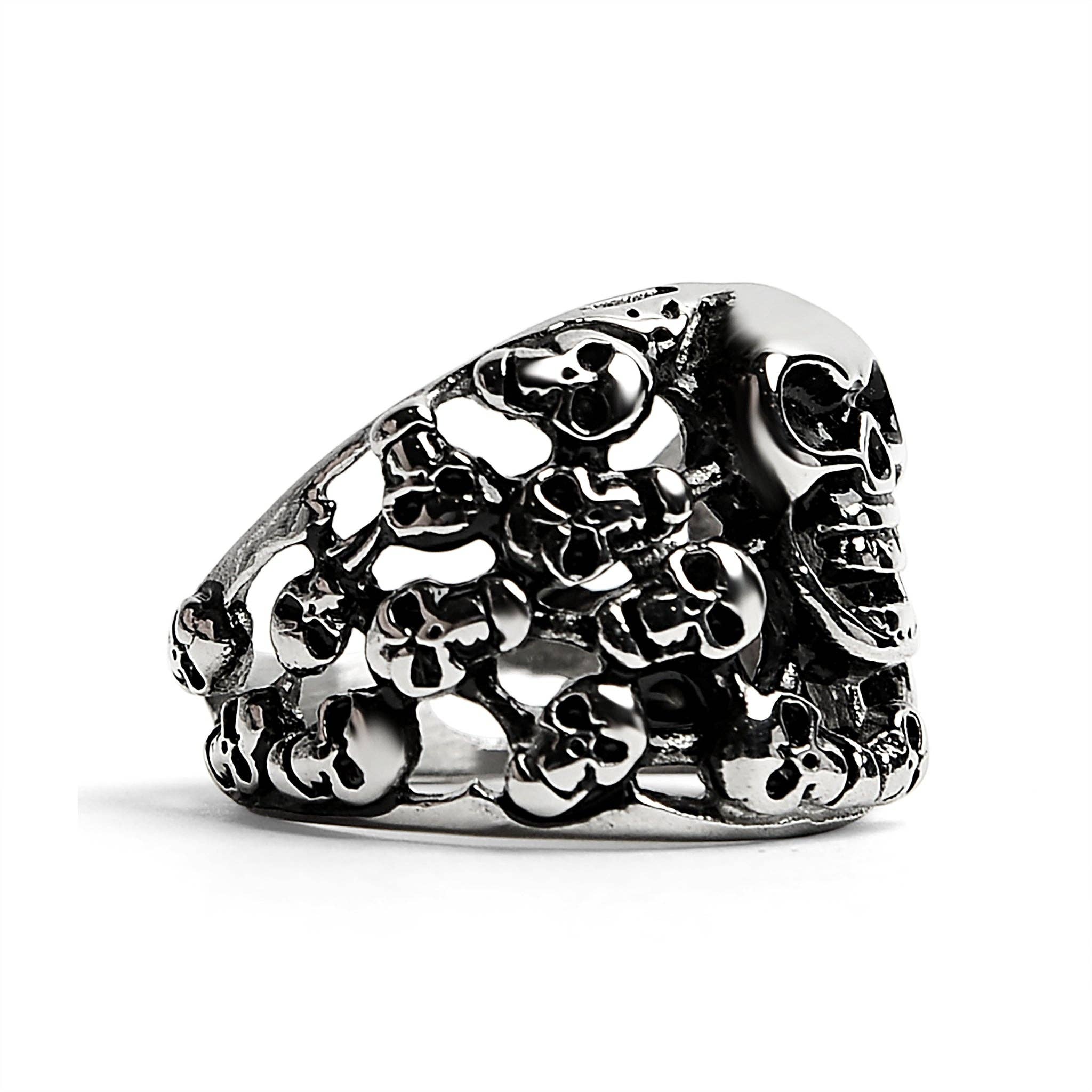 Anillo de acero inoxidable pulido con múltiples calaveras: 9